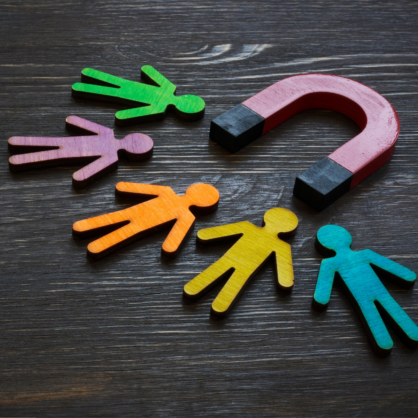 people coming together under a magnet